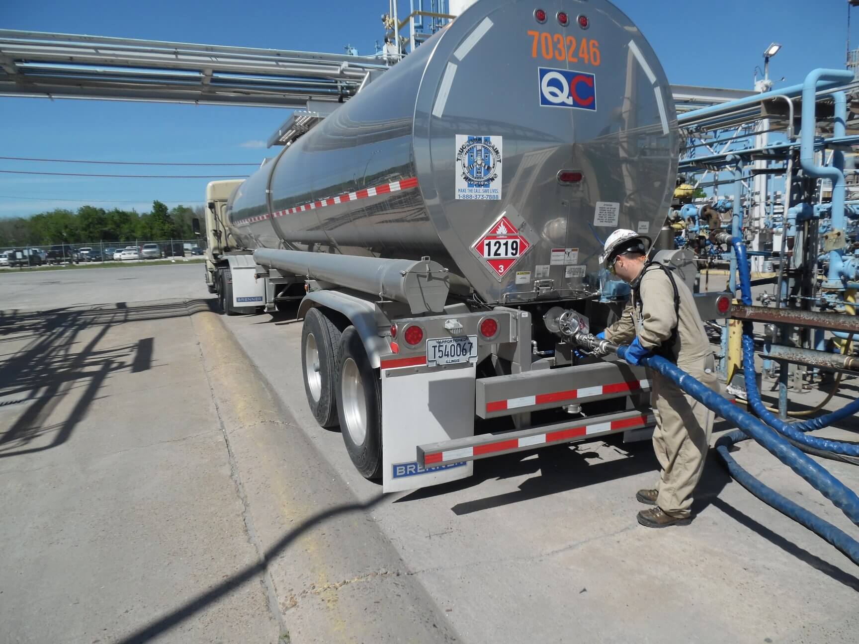 Slide 3 of 5 LyondellBasell employee loading isopropyl alcohol into a truck for delivery