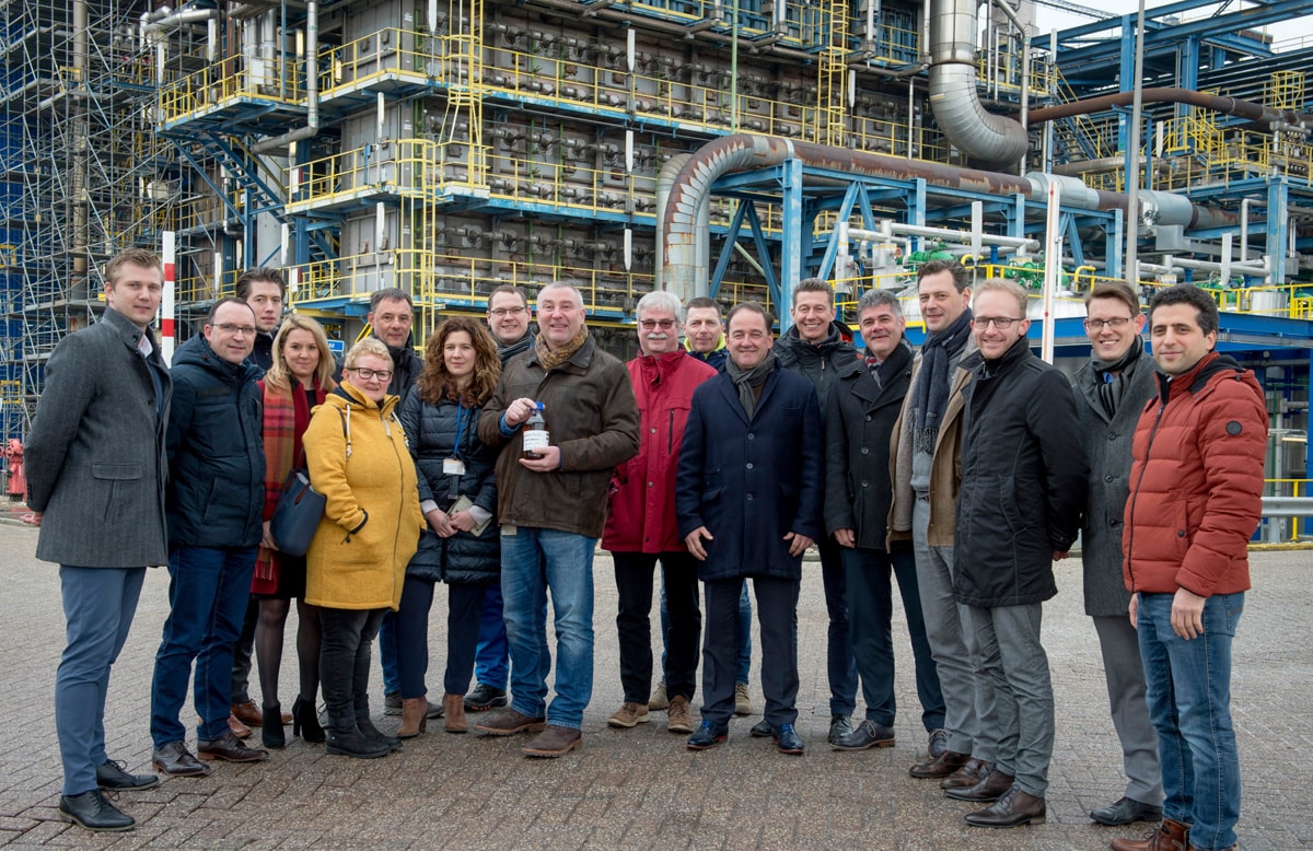 Members of the SABIC team in the Netherlands celebrate the production of the first volumes of
                                    SABIC’s certified circular polymers from mixed plastic waste.